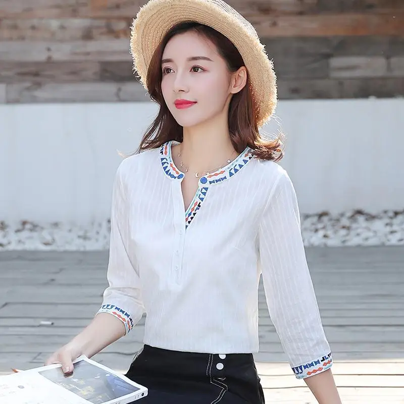

White shirt women's 2021 spring new quarter sleeve loose top V-neck embroidered shirt
