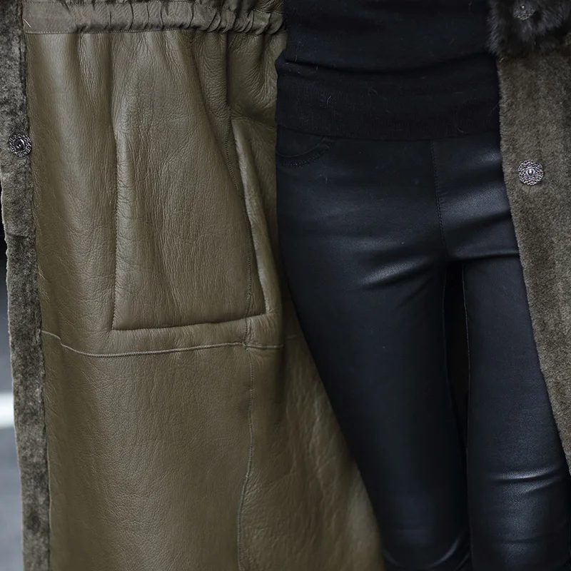 

2020 Winter new fashionable women's coat with hooded mink fur fur and mink fur all-in-one coat