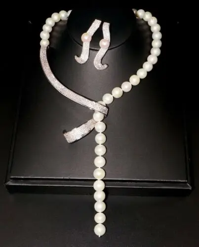 

Великолепные 10-11 мм Южное море круглые белые жемчужные ожерелья и серьги