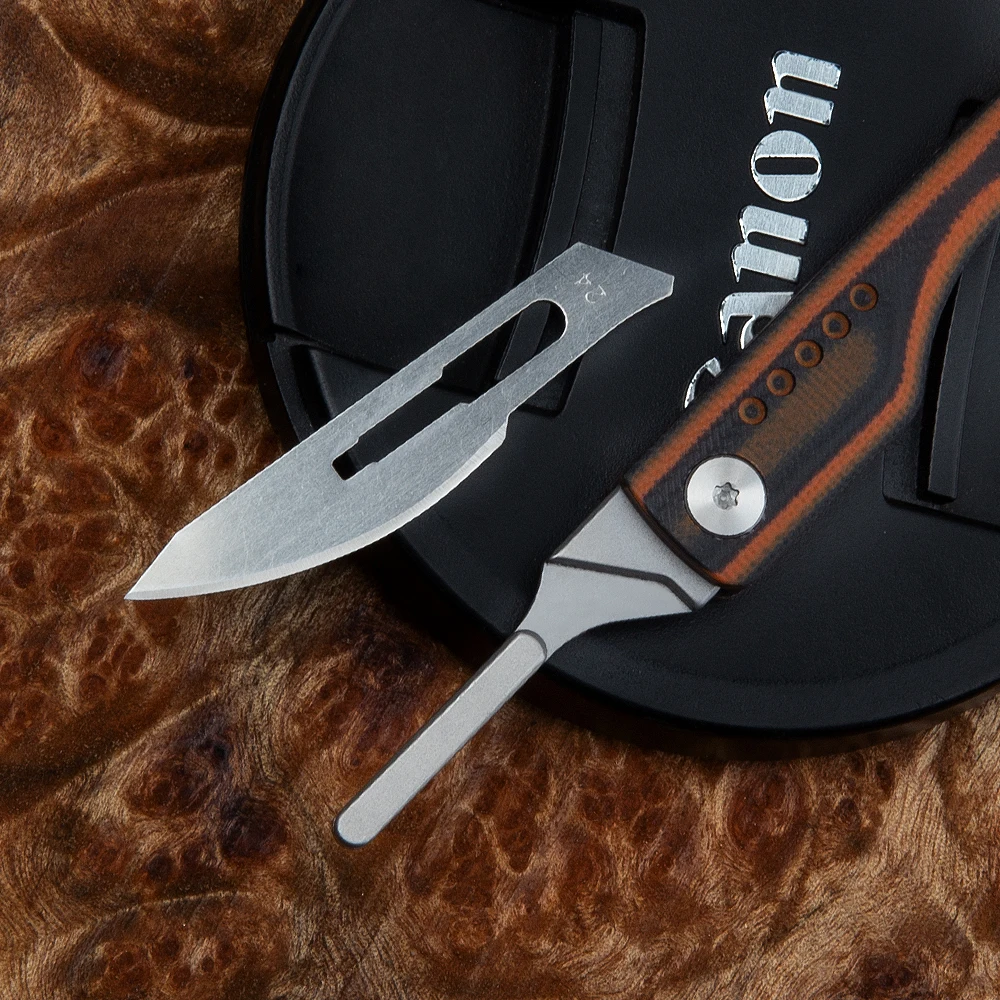 

Titanium alloy knife carbon fiber knife G10 knife tactical pen outdoor self-defense knife outdoor self-defense pen