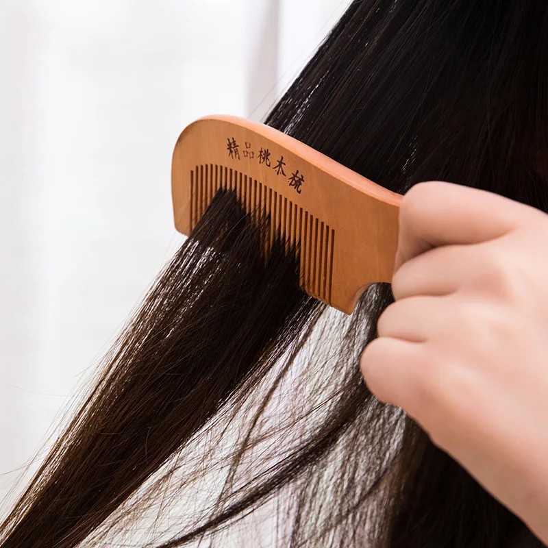 

Round handle natural peach comb home anti-static massage wooden comb portable does not hurt hair