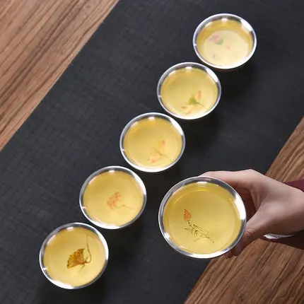 Керамическая чайная чашка ручной работы с внутренним покрытием из серебра 999