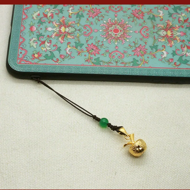 

Creative brass gold-plated Apple mobile phone pendant wallet male pendant female mobile phone lanyard short U disk pendant