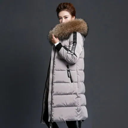 Зимняя женская куртка на утином пуху новая с натуральным енотом и надписью Rur