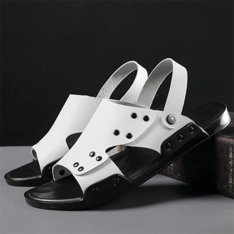 

2021 New Men's Shoes Fashion Solid Color PU Rivet Hollow Open Toe Flat Heel Comfortable Casual All-match Sandals KS075