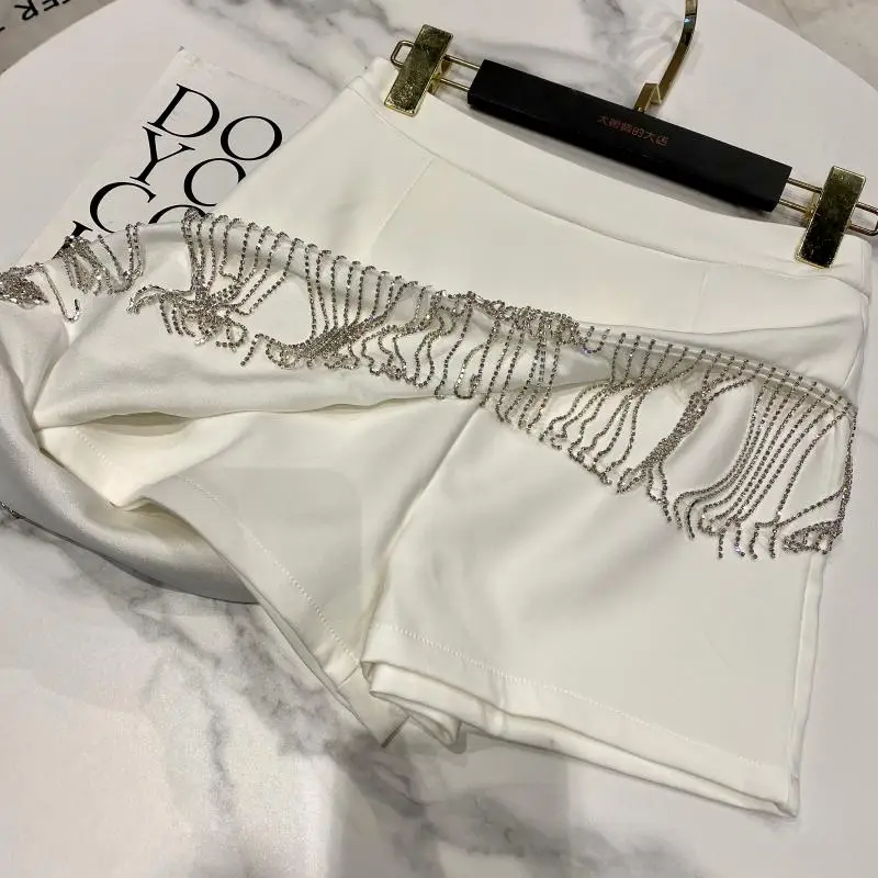 

Streetwear 2020 Summer New Hem Rhinestone Chain Tassel Shiny Nightclub Skirt Female Retro High Waist Mini Skirt for Party