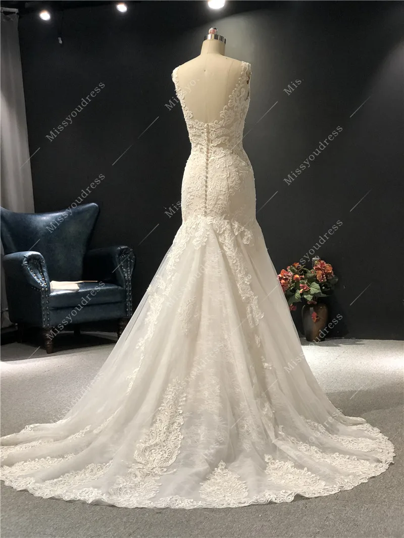 2021 Newest High Quality Customized Ivory Lace Deep V-neck Sleeveless Open Back Mermaid Floor Length with Train Wedding Dress