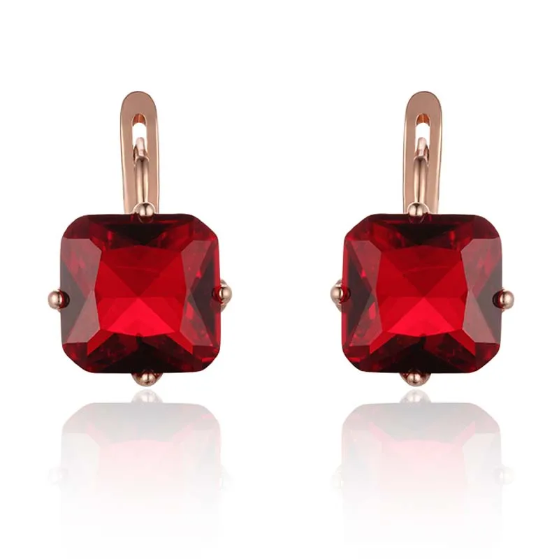 Женские серьги со светло голубым камнем из розового золота 585 пробы с квадратным