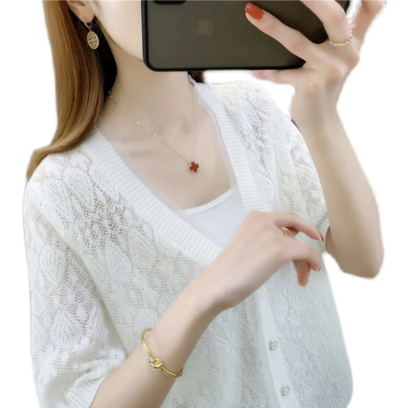 

19977 (3 rooms, 10 rows, No.1 lower) solid color lace hollow out short sleeve knitted cardigan 56