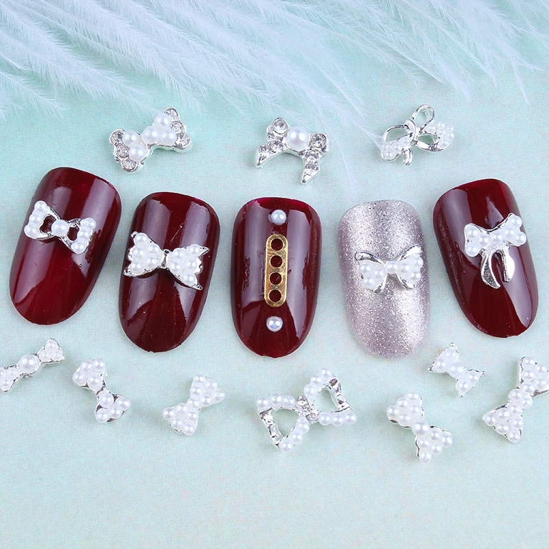

100Pcs/Lot Nail art , 10pcs Strass 3d nail bow tie crystal ab pearl nail art decoration metal charms jewelry.7878jhhg