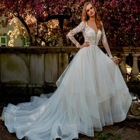 glamorous white v neck long sleeve floor tail appliqu%c3%a9d open back a line lace wedding wedding dress
