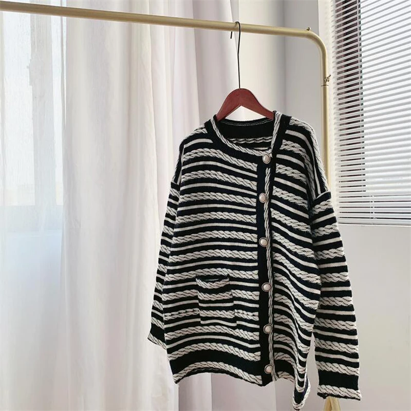

Autumn and winter women's casual striped pocket decoration asymmetric cardigan sweater