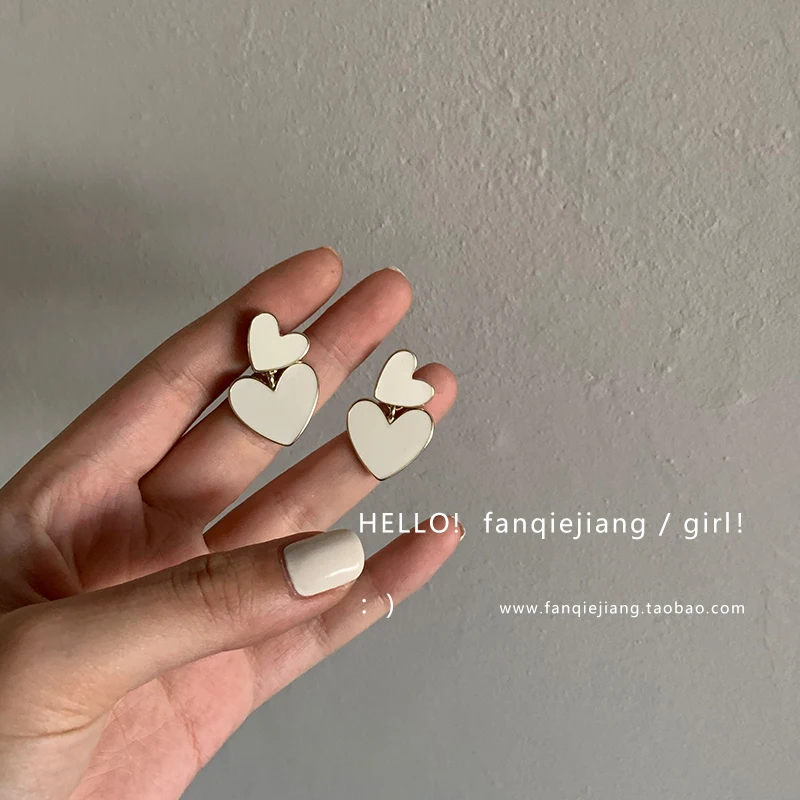 

XIYANIKE 2020 Korean New Sweet Size White Double Heart Earrings Simple Cute Little Pendant Earrings For Women Statement Jewelry
