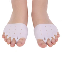 2pcspair silicone comfortable toe braces 5 holes hallux valgus straightener orthodontic foot toe braces for foot care t0586
