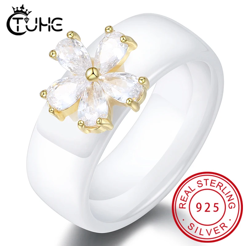 Женское керамическое кольцо с фианитами золотого цвета декором листья и цветка