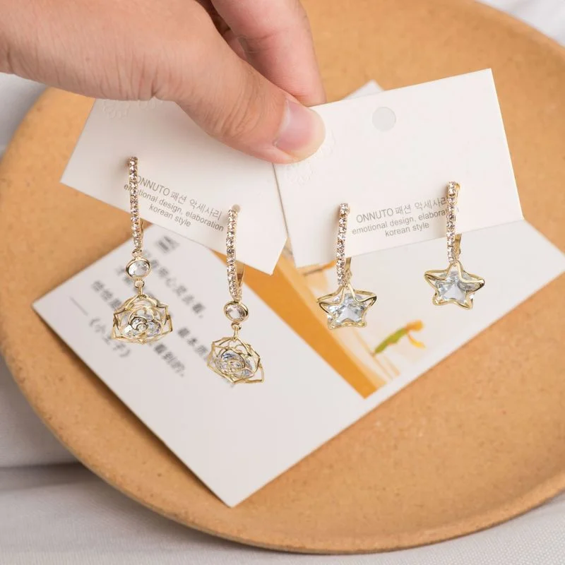 

Женские изысканные модные геометрические Висячие серьги Стразы с полыми звездами цветами темпераментные женские ювелирные изделия аксесс...