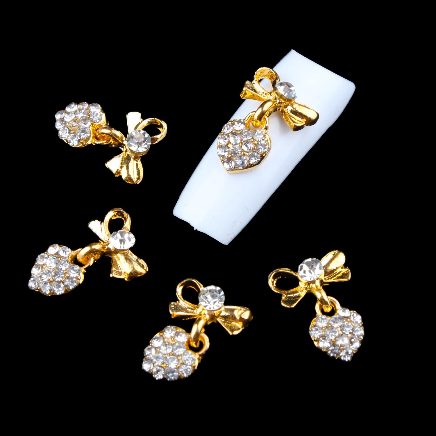 100Pcs Pendant Heart Alloy Bow Nail Charm Jewels Decorations White Crystal Gold Alloy Access Nail Art Heart Rhinestones Decors