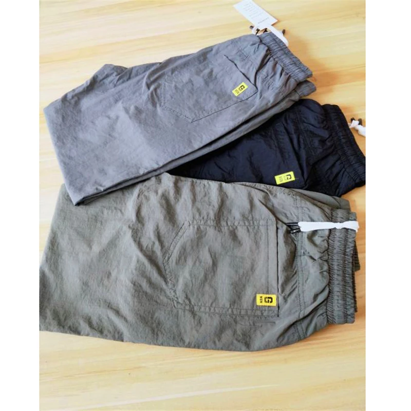 Повседневные мужские брюки Лето 2021 Новый стиль Модные уличные легкие свободные