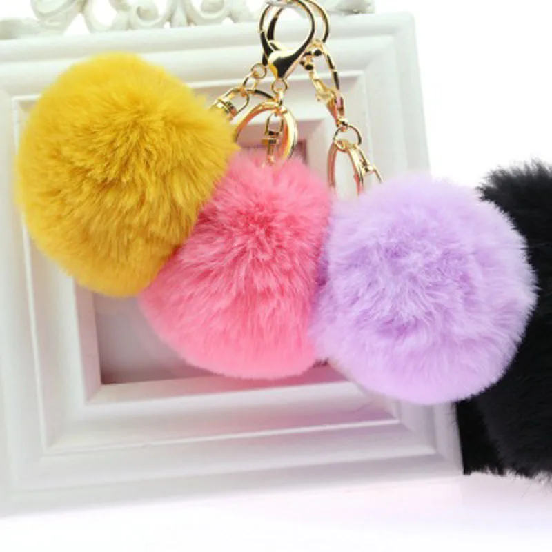 Большая сумочка из искусственного жемчуга с шариком кроличьего меха брелоком