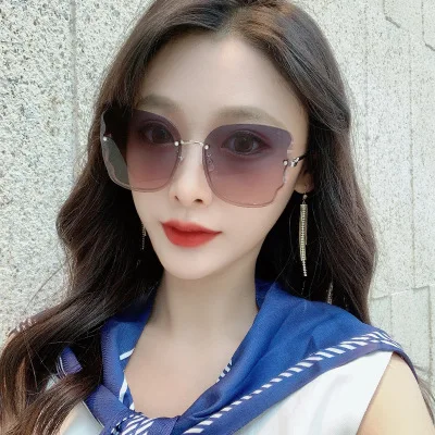 

New sunglasses ladies fashion frameless diamond nylon sunglasses ladies tide butterfly sunglasses