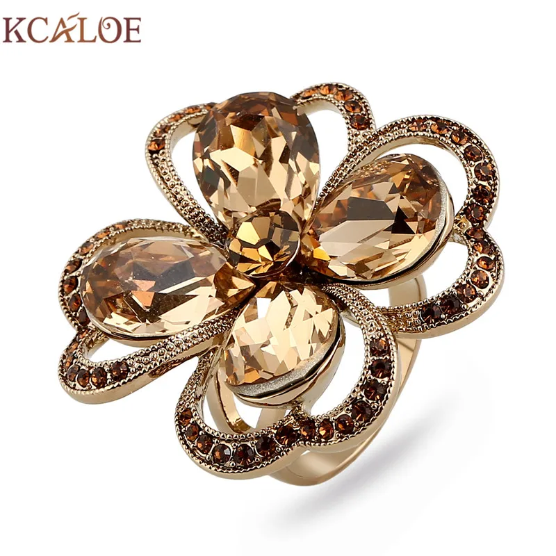 Женское кольцо с большим цветком KCALOE Золотое из титана зелеными Австрийскими