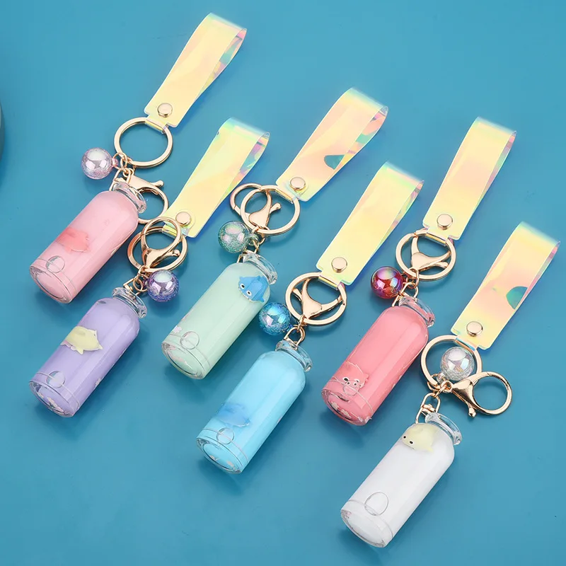

Cute Moving Floating Quicksand Fish Dolphin Liquid Keychain For Women Girl Backpack Car Keychain Ring Creative Bottle Keychains