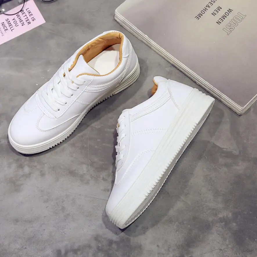 Модные белые кожаные женские кроссовки на массивной подошве женская спортивная