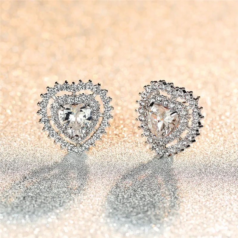 

Luxury Female Rainbow Crystal Opal Earrings Charm Silver Color Stud Earrings Cute Love Heart Hollow Wedding Earrings For Women