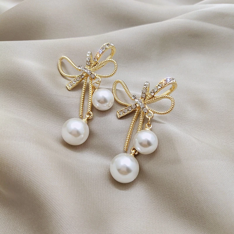 

Personality Bowknot Simple Pearl Earrings Female 2021 Trendy Fashion Jewelry exquisite Elegant accessory Fashion Stud Earrings