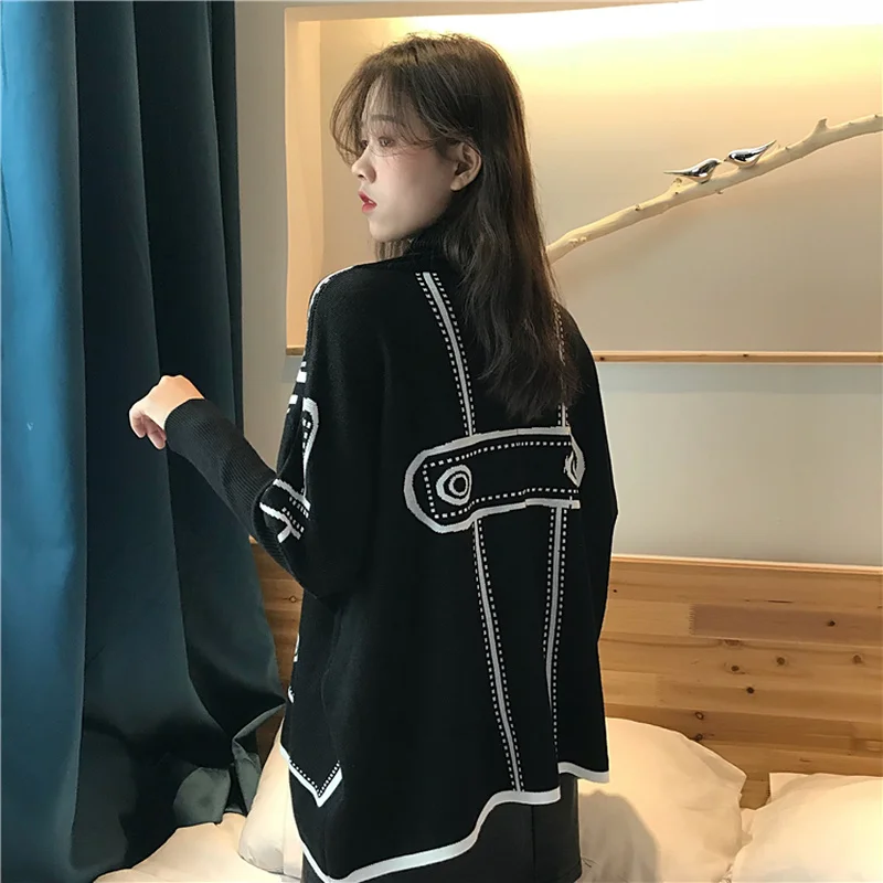 Свитер женский вязаный с высоким воротом черного цвета большого размера для