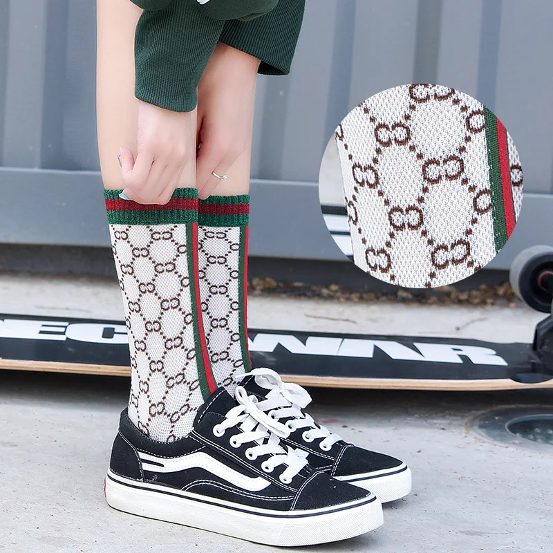 

New alphabet men's and women's socks Japanese college wind pipe socks alphabet cotton socks fashion sports socks