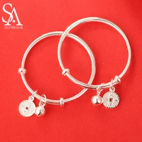 sa silverage solid 999 sterling silver push pull foot silver bell childrens day bangles luxury smart childrens bracelet baby