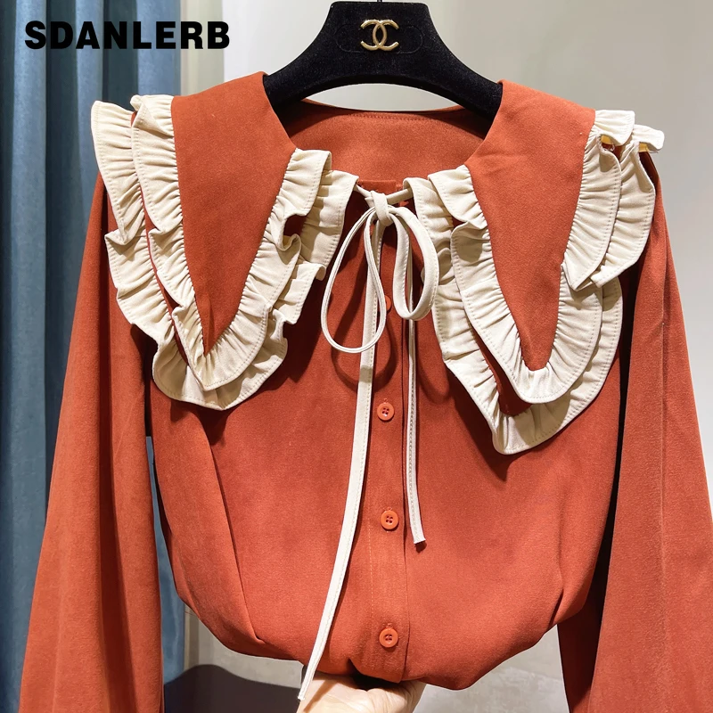 

Блузка женская двухслойная с оборками и длинным рукавом