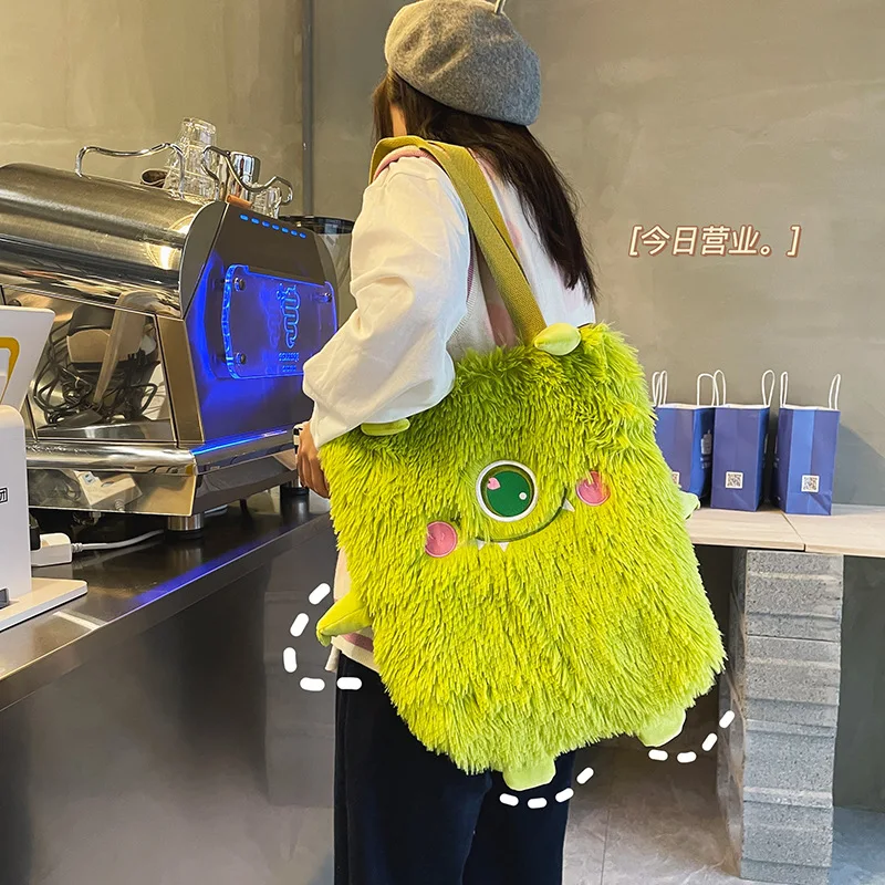 

Cute and funny personality embroidery little monster plush soft girl student shoulder bag female bag