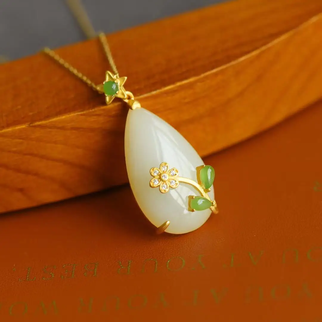 

Natural Hetian Jade White Jade Big Water Drop Pendant Ancient Gold Inlaid Little Flower Pendant Palace Styl jade necklace