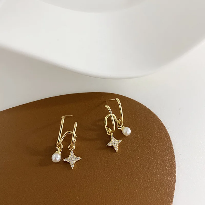 

Модные инкрустированные Циркон изысканные серьги-подвески в форме звезды личность геометрический изогнутый, серьги со шпилькой, для женщи...