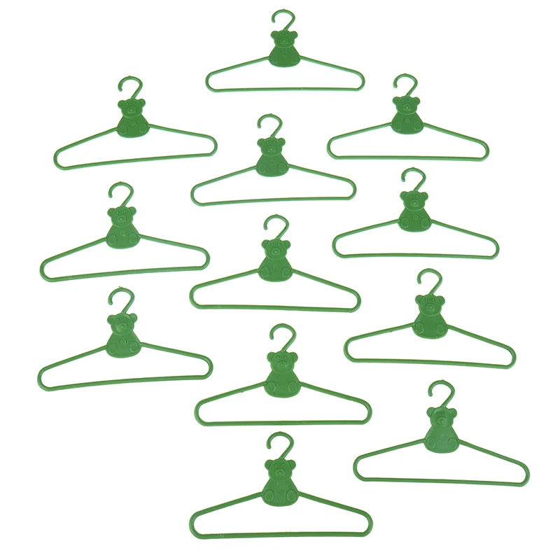 

12PCS/Lot Lovely Green Hangers Mini Cute Wardrobe Dress Coat Clothes Plastic Accessories For Mini Doll Dollhouse Gift Toy