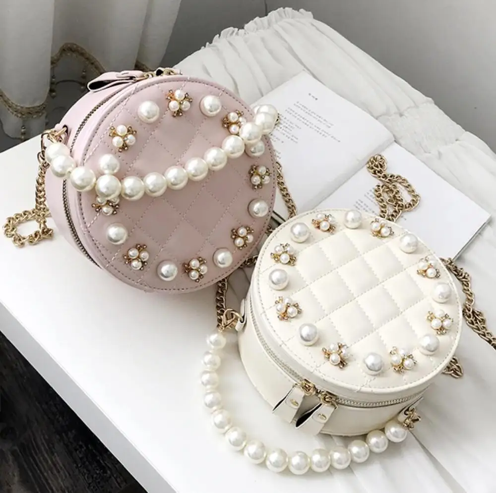 Женская кожаная сумка тоут элегантная круглая с жемчугом дизайнерская