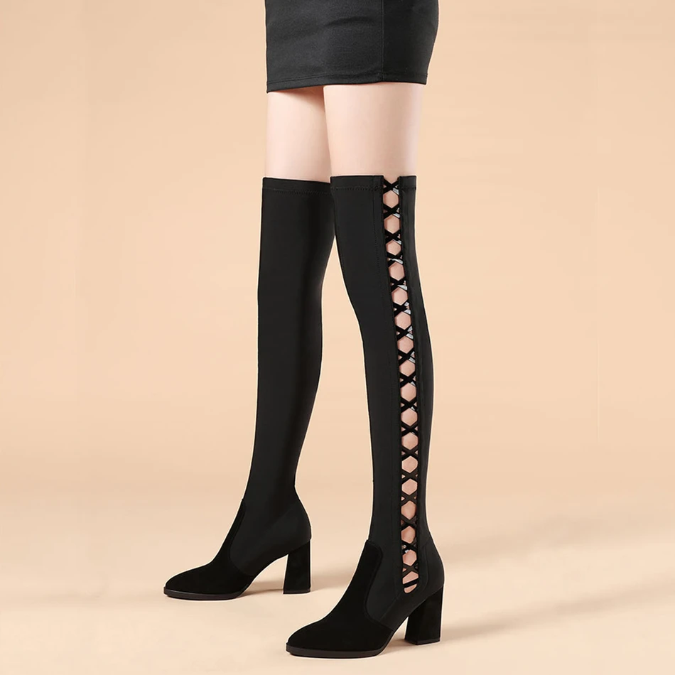Черные женские сапоги выше колена на высоком каблуке обтягивающие зимние