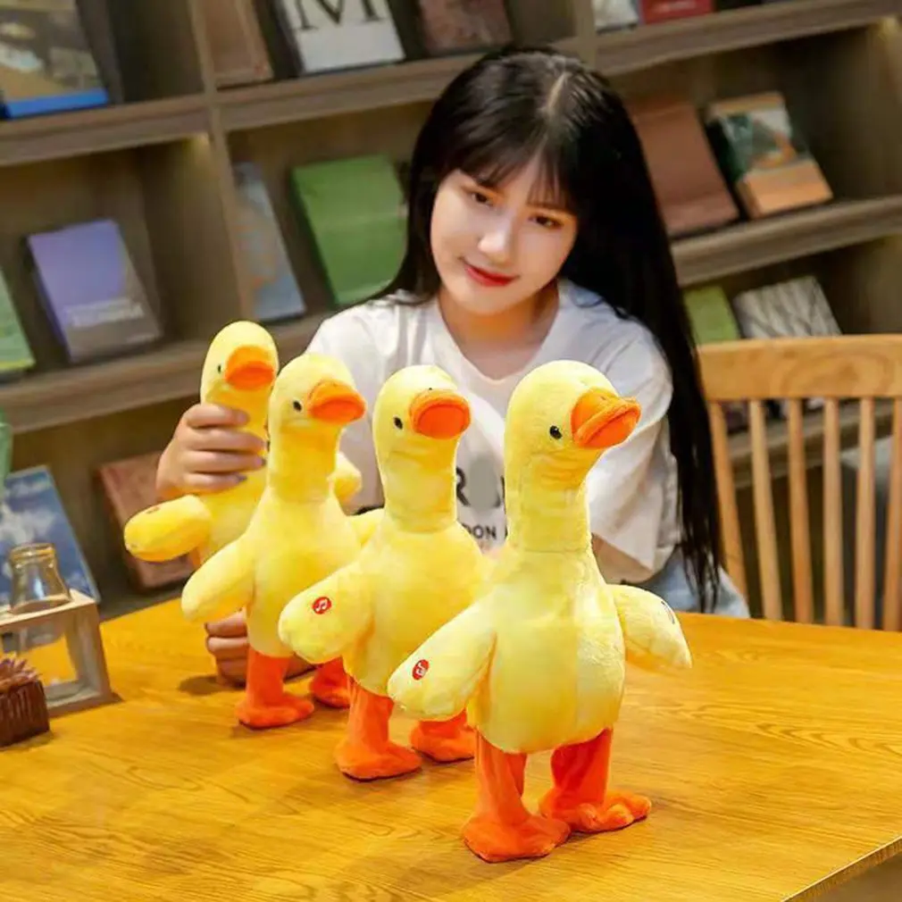 

Electric Little Yellow Duck Plush Toy Walk Toy Sing And Raise Neck Duck Yellow Duck Toy Anime Electric Plush Toys