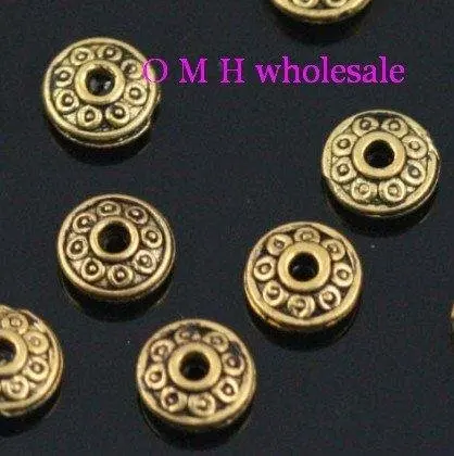 

OMH wholesale Free ship 20pcs golden bicone spacer beads Jewelry metal beads 8.5x5mm ZL523