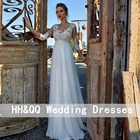 Шифоновое платье-трапеция с завышенной талией, рукавом 34 и круглым вырезом