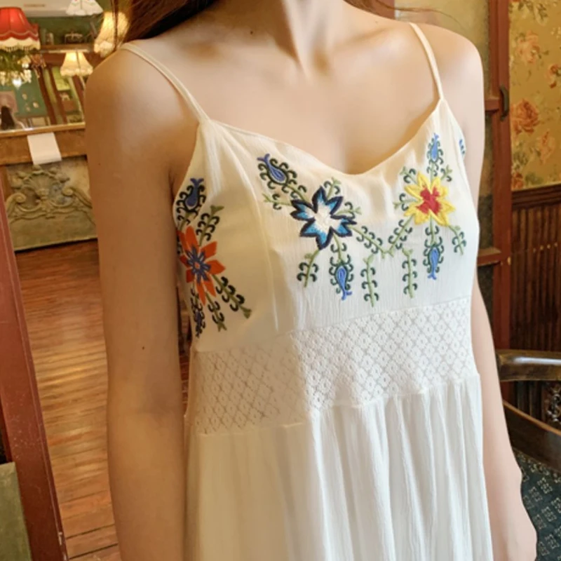 

2020 summer new Bohemian tourism resort seaside beach long style dress retro embroidery sexy halter dress Korean version dress
