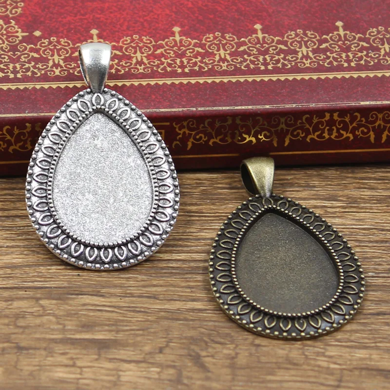 Стеклянная основа для кабошона в форме капли воды размером 25 х18 мм 4 шт. |