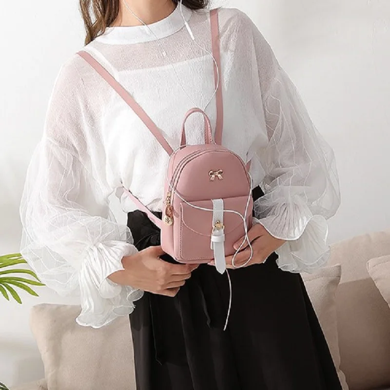 

Fashion Women Elegant Backpack School Bag Ladies Luxury PU Leather Girl Bow Hollow Leaf Shoulder Messenger Bag Spring 2021