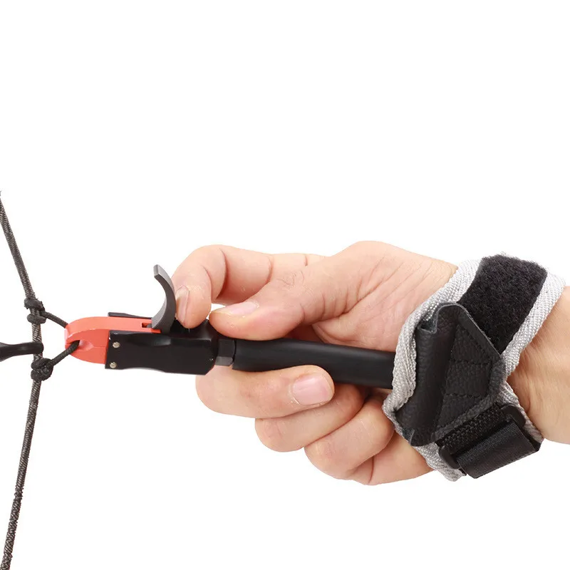 

Композитные аксессуары для лука и стрелы, оборудование для стрельбы из лука с красным Ротом, TP412, зажимной тип, спуск запястья, устройство дл...