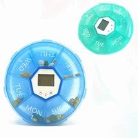 7 cells electronic pill box portable timer reminder round seven cell digital night lighting pill box