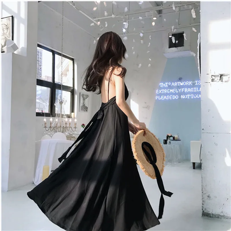 

Summer temperament little black dress beach seaside vacation fairy scheming backless and thin high waist suspender long dress
