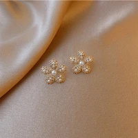 xiyanike gold color pearl rhinestone flower stud earrings 2021 trend alloy earrings for women party gift fashion jewelry brinco