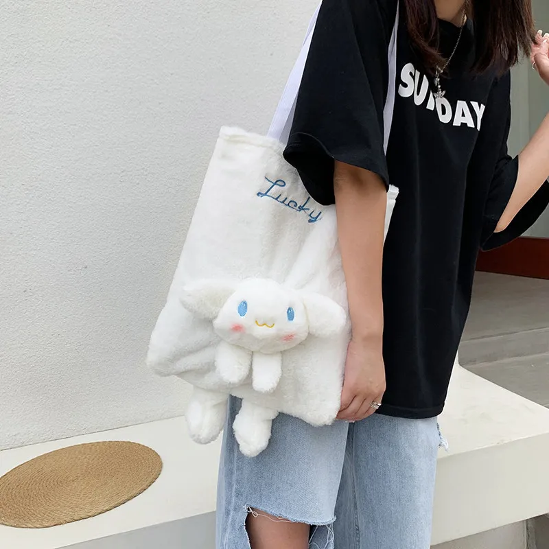 

Korean women ins cute doll portable plush handbag female 2021 new girl heart foldable doll shoulder bag